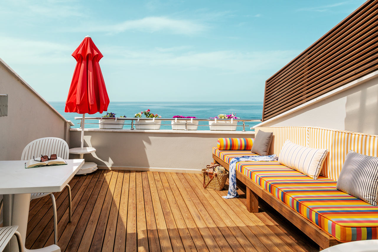Penthouse Suite med balkong og havutsikt